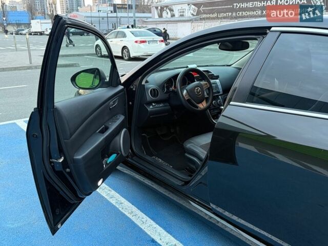 Черный Мазда 6, объемом двигателя 2 л и пробегом 247 тыс. км за 6100 $, фото 7 на Automoto.ua
