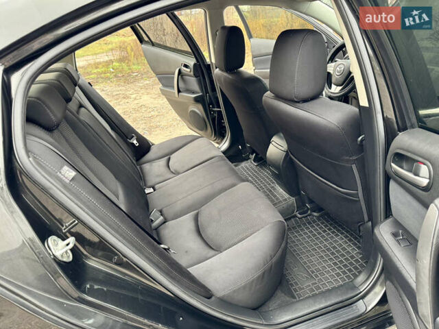 Черный Мазда 6, объемом двигателя 2 л и пробегом 264 тыс. км за 6990 $, фото 19 на Automoto.ua