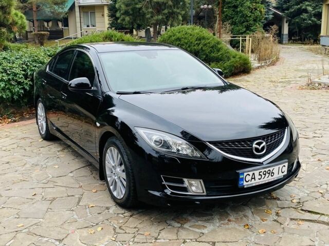 Черный Мазда 6, объемом двигателя 2 л и пробегом 266 тыс. км за 6600 $, фото 1 на Automoto.ua