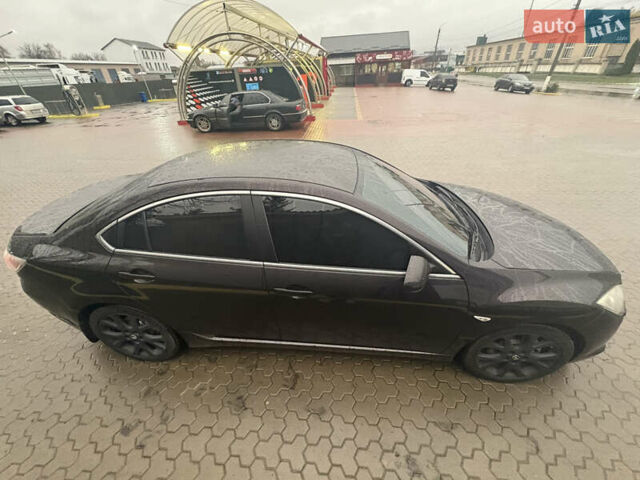 Черный Мазда 6, объемом двигателя 2.5 л и пробегом 250 тыс. км за 6450 $, фото 5 на Automoto.ua