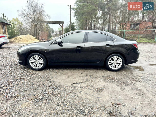 Черный Мазда 6, объемом двигателя 2 л и пробегом 264 тыс. км за 6990 $, фото 1 на Automoto.ua