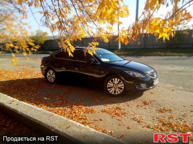 Черный Мазда 6, объемом двигателя 2 л и пробегом 140 тыс. км за 6990 $, фото 1 на Automoto.ua