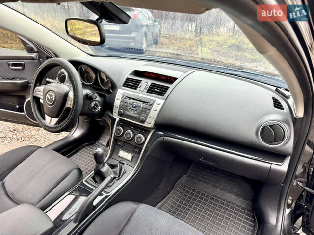 Черный Мазда 6, объемом двигателя 2 л и пробегом 264 тыс. км за 6990 $, фото 22 на Automoto.ua