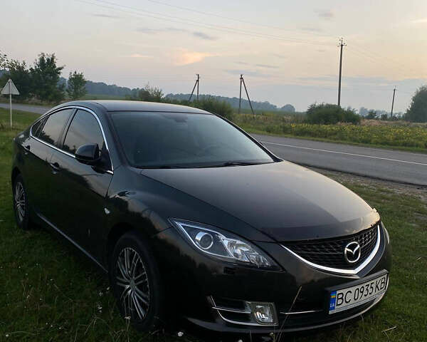 Черный Мазда 6, объемом двигателя 2 л и пробегом 281 тыс. км за 6600 $, фото 5 на Automoto.ua