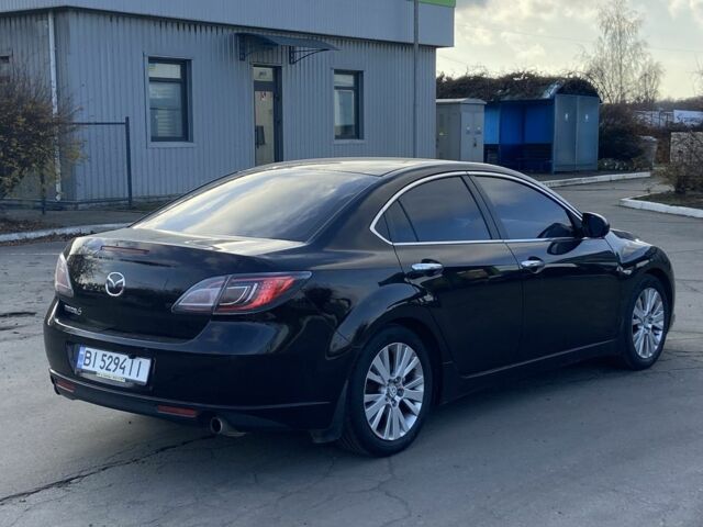 Черный Мазда 6, объемом двигателя 2 л и пробегом 180 тыс. км за 7700 $, фото 4 на Automoto.ua