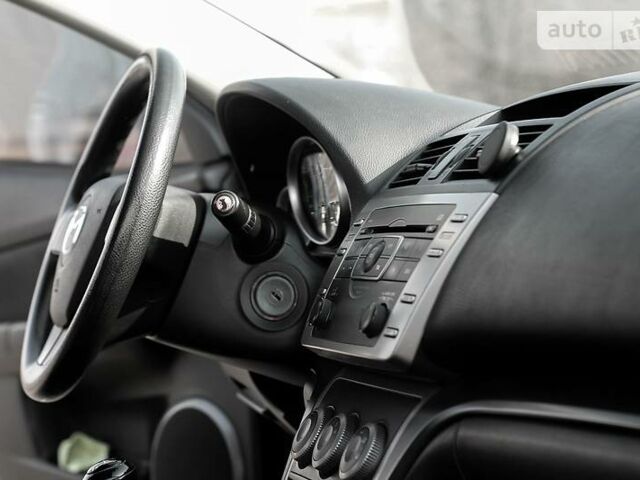 Черный Мазда 6, объемом двигателя 1.8 л и пробегом 250 тыс. км за 7000 $, фото 21 на Automoto.ua