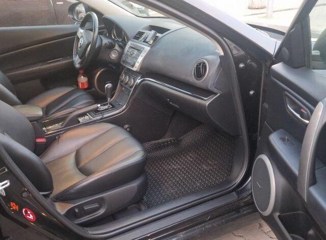 Черный Мазда 6, объемом двигателя 2 л и пробегом 142 тыс. км за 8100 $, фото 7 на Automoto.ua