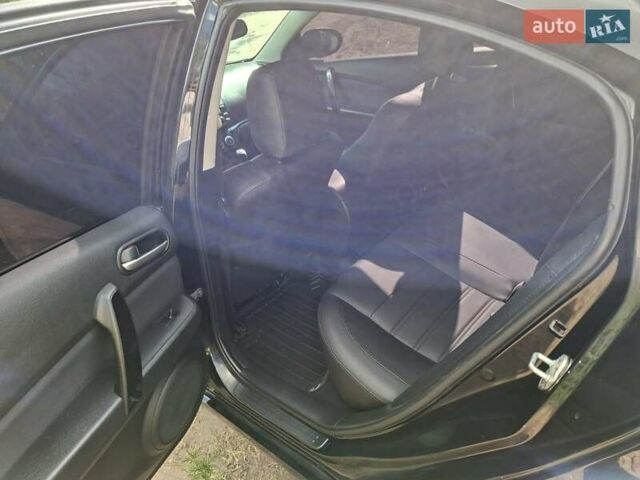 Чорний Мазда 6, об'ємом двигуна 2 л та пробігом 245 тис. км за 6900 $, фото 2 на Automoto.ua