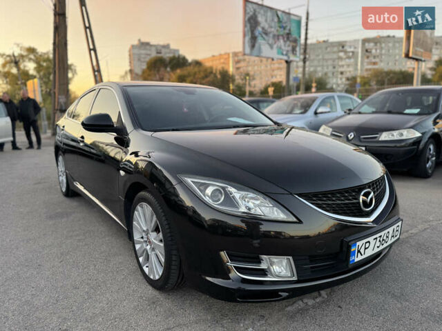 Черный Мазда 6, объемом двигателя 2 л и пробегом 256 тыс. км за 7500 $, фото 1 на Automoto.ua