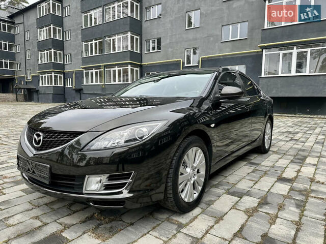 Черный Мазда 6, объемом двигателя 2 л и пробегом 253 тыс. км за 6500 $, фото 1 на Automoto.ua