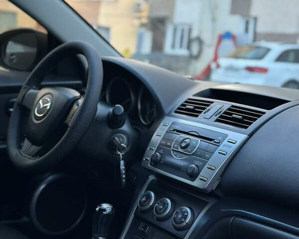 Чорний Мазда 6, об'ємом двигуна 1.8 л та пробігом 252 тис. км за 7300 $, фото 14 на Automoto.ua
