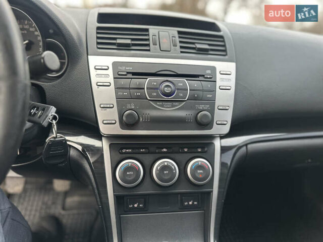 Черный Мазда 6, объемом двигателя 1.8 л и пробегом 238 тыс. км за 6800 $, фото 12 на Automoto.ua