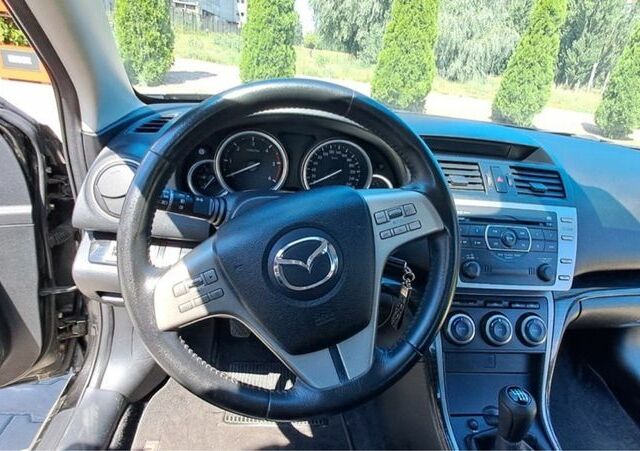Черный Мазда 6, объемом двигателя 2 л и пробегом 140 тыс. км за 6500 $, фото 6 на Automoto.ua