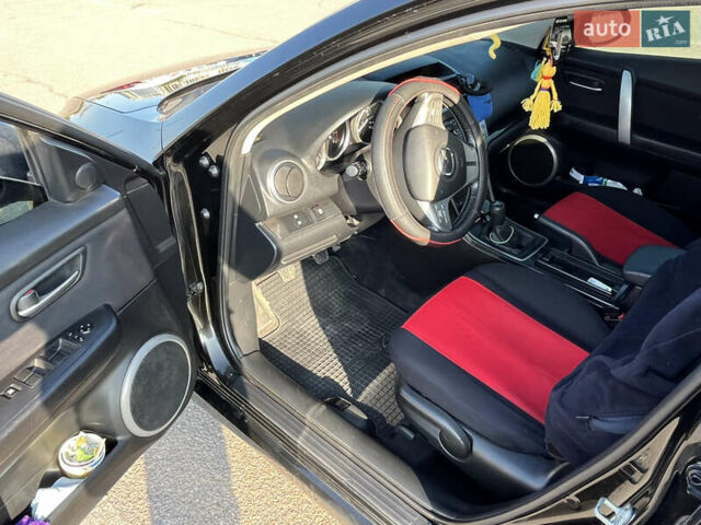 Чорний Мазда 6, об'ємом двигуна 2 л та пробігом 312 тис. км за 6600 $, фото 9 на Automoto.ua