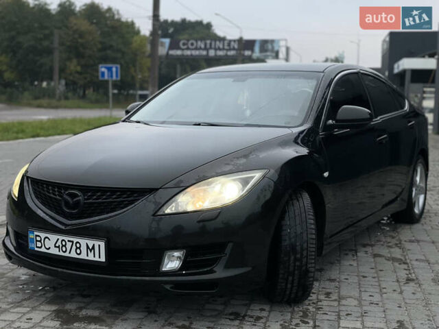 Черный Мазда 6, объемом двигателя 2 л и пробегом 289 тыс. км за 6600 $, фото 2 на Automoto.ua