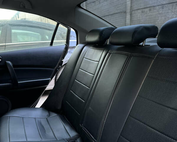 Чорний Мазда 6, об'ємом двигуна 1.8 л та пробігом 252 тис. км за 7300 $, фото 10 на Automoto.ua