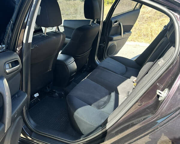 Чорний Мазда 6, об'ємом двигуна 1.8 л та пробігом 237 тис. км за 6999 $, фото 5 на Automoto.ua