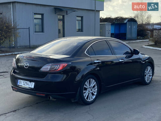 Черный Мазда 6, объемом двигателя 2 л и пробегом 180 тыс. км за 7700 $, фото 4 на Automoto.ua