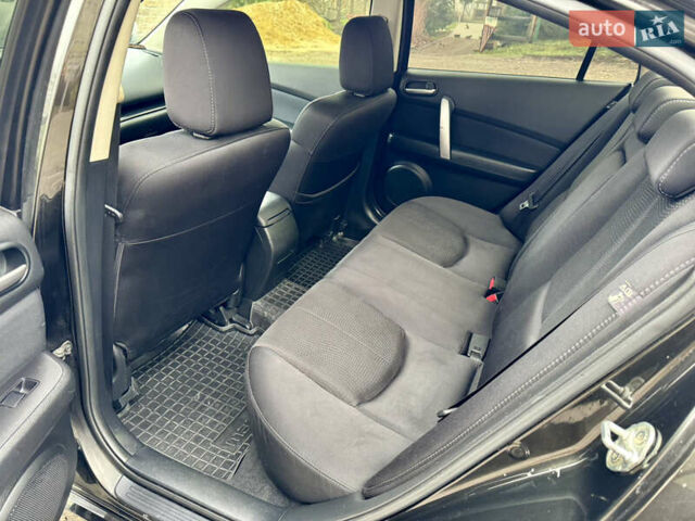 Черный Мазда 6, объемом двигателя 2 л и пробегом 264 тыс. км за 6990 $, фото 17 на Automoto.ua