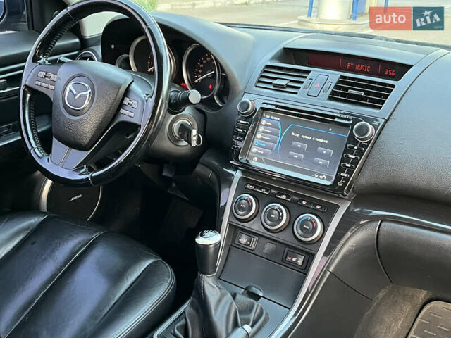 Черный Мазда 6, объемом двигателя 2 л и пробегом 246 тыс. км за 5700 $, фото 17 на Automoto.ua