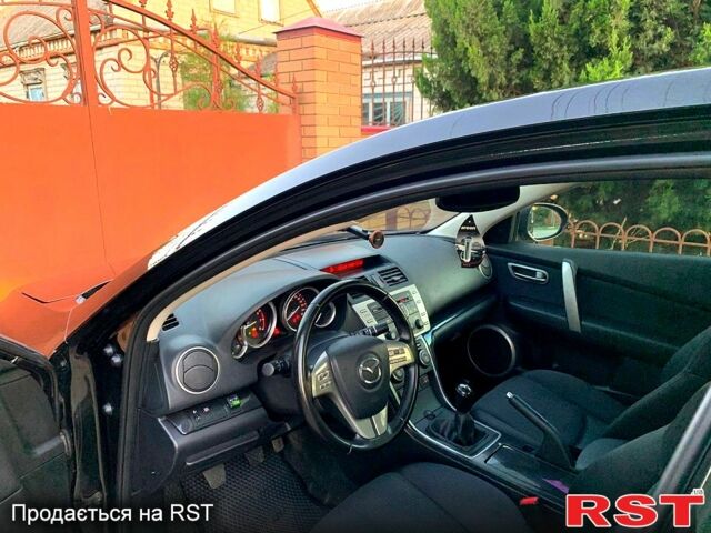 Черный Мазда 6, объемом двигателя 1.8 л и пробегом 181 тыс. км за 7100 $, фото 8 на Automoto.ua