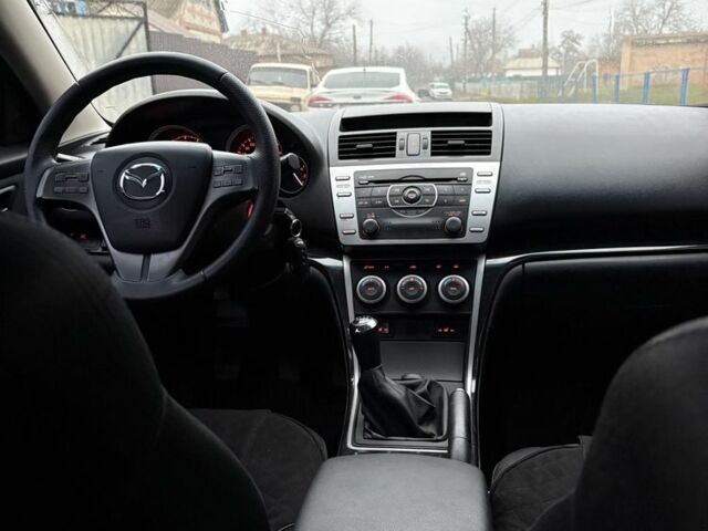 Черный Мазда 6, объемом двигателя 2 л и пробегом 280 тыс. км за 6500 $, фото 6 на Automoto.ua