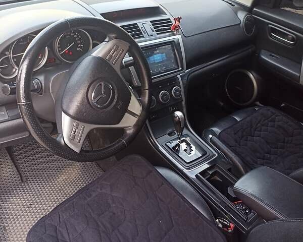 Черный Мазда 6, объемом двигателя 2 л и пробегом 283 тыс. км за 7200 $, фото 4 на Automoto.ua