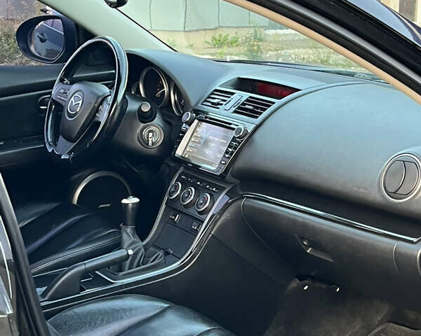 Черный Мазда 6, объемом двигателя 2 л и пробегом 246 тыс. км за 5700 $, фото 16 на Automoto.ua