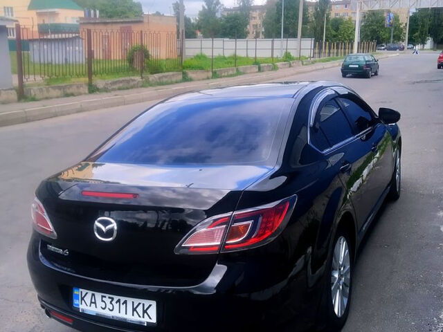 Черный Мазда 6, объемом двигателя 2 л и пробегом 307 тыс. км за 7750 $, фото 1 на Automoto.ua