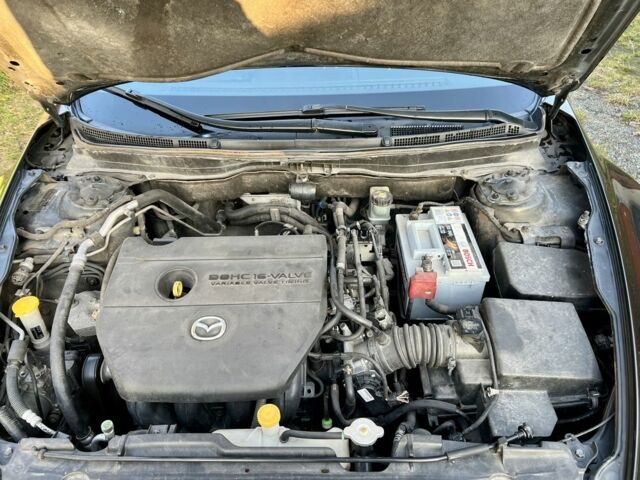 Черный Мазда 6, объемом двигателя 2.4 л и пробегом 234 тыс. км за 3699 $, фото 18 на Automoto.ua