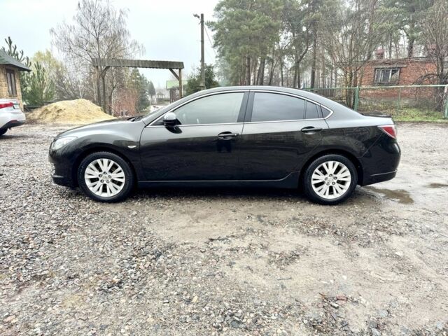 Черный Мазда 6, объемом двигателя 2 л и пробегом 264 тыс. км за 6890 $, фото 1 на Automoto.ua