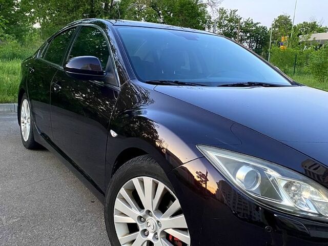 Черный Мазда 6, объемом двигателя 2 л и пробегом 242 тыс. км за 7000 $, фото 1 на Automoto.ua