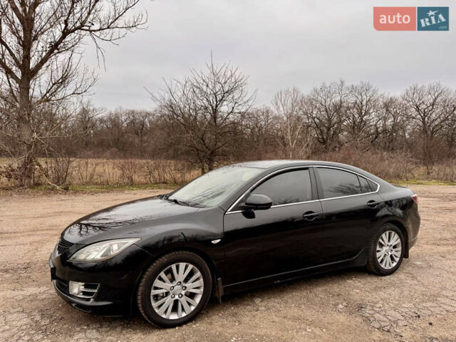 Черный Мазда 6, объемом двигателя 2 л и пробегом 258 тыс. км за 6900 $, фото 1 на Automoto.ua