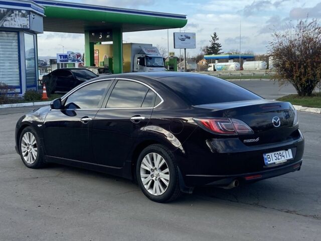 Черный Мазда 6, объемом двигателя 2 л и пробегом 180 тыс. км за 7700 $, фото 6 на Automoto.ua