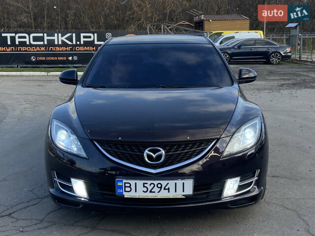 Черный Мазда 6, объемом двигателя 2 л и пробегом 180 тыс. км за 7700 $, фото 1 на Automoto.ua