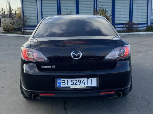 Черный Мазда 6, объемом двигателя 2 л и пробегом 180 тыс. км за 7700 $, фото 5 на Automoto.ua