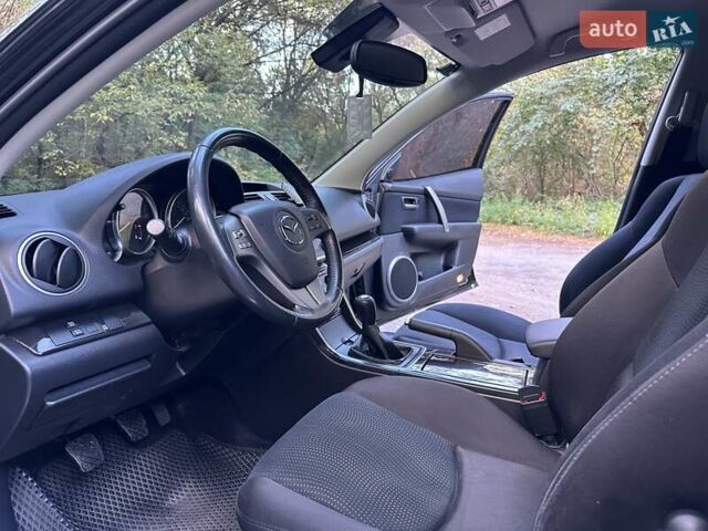 Черный Мазда 6, объемом двигателя 2 л и пробегом 129 тыс. км за 9450 $, фото 18 на Automoto.ua