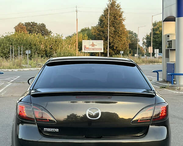 Черный Мазда 6, объемом двигателя 2 л и пробегом 246 тыс. км за 5700 $, фото 5 на Automoto.ua
