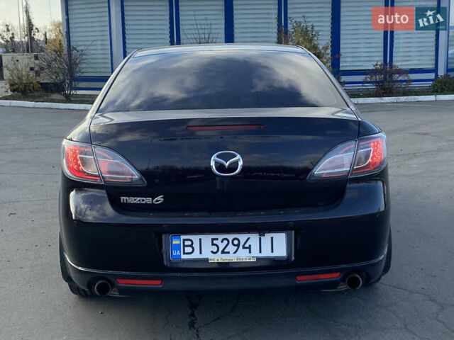 Черный Мазда 6, объемом двигателя 2 л и пробегом 180 тыс. км за 7700 $, фото 5 на Automoto.ua