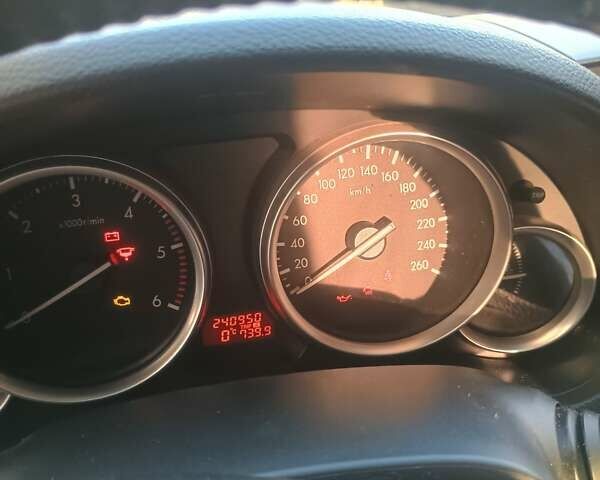Черный Мазда 6, объемом двигателя 2 л и пробегом 241 тыс. км за 7000 $, фото 7 на Automoto.ua