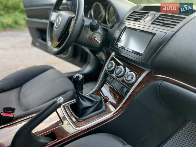 Чорний Мазда 6, об'ємом двигуна 1.8 л та пробігом 312 тис. км за 5500 $, фото 18 на Automoto.ua