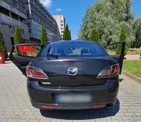 Черный Мазда 6, объемом двигателя 2 л и пробегом 140 тыс. км за 6500 $, фото 1 на Automoto.ua