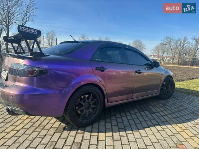 Черный Мазда 6, объемом двигателя 2.3 л и пробегом 190 тыс. км за 8500 $, фото 13 на Automoto.ua