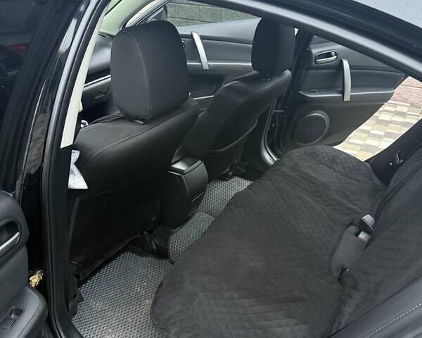 Черный Мазда 6, объемом двигателя 2 л и пробегом 280 тыс. км за 6500 $, фото 6 на Automoto.ua