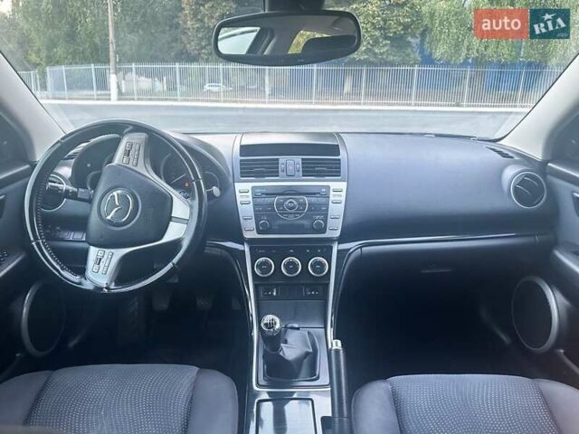 Чорний Мазда 6, об'ємом двигуна 2 л та пробігом 239 тис. км за 6900 $, фото 26 на Automoto.ua