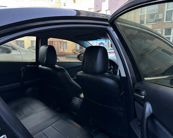 Чорний Мазда 6, об'ємом двигуна 1.8 л та пробігом 252 тис. км за 7300 $, фото 12 на Automoto.ua