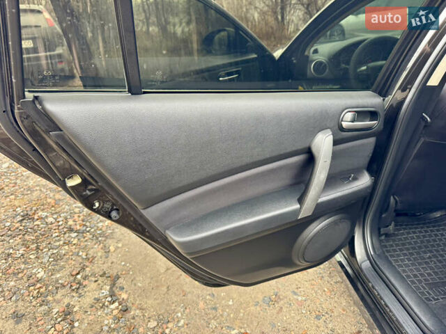 Черный Мазда 6, объемом двигателя 2 л и пробегом 264 тыс. км за 6990 $, фото 18 на Automoto.ua