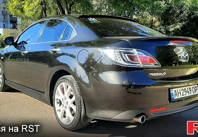 Черный Мазда 6, объемом двигателя 2.5 л и пробегом 200 тыс. км за 8300 $, фото 1 на Automoto.ua