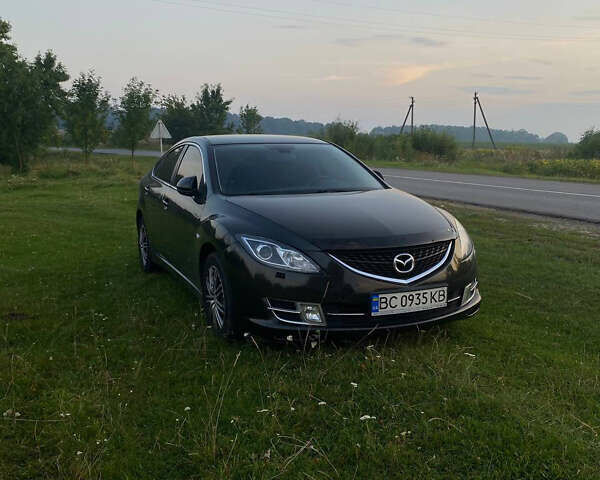 Черный Мазда 6, объемом двигателя 2 л и пробегом 281 тыс. км за 6600 $, фото 4 на Automoto.ua