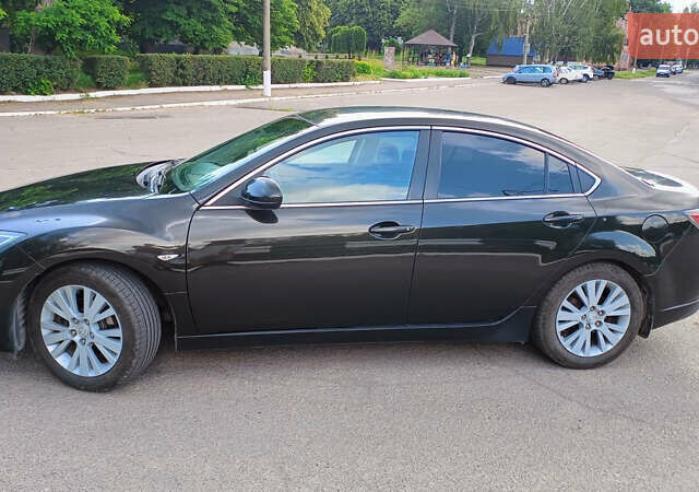 Черный Мазда 6, объемом двигателя 2 л и пробегом 211 тыс. км за 7850 $, фото 7 на Automoto.ua